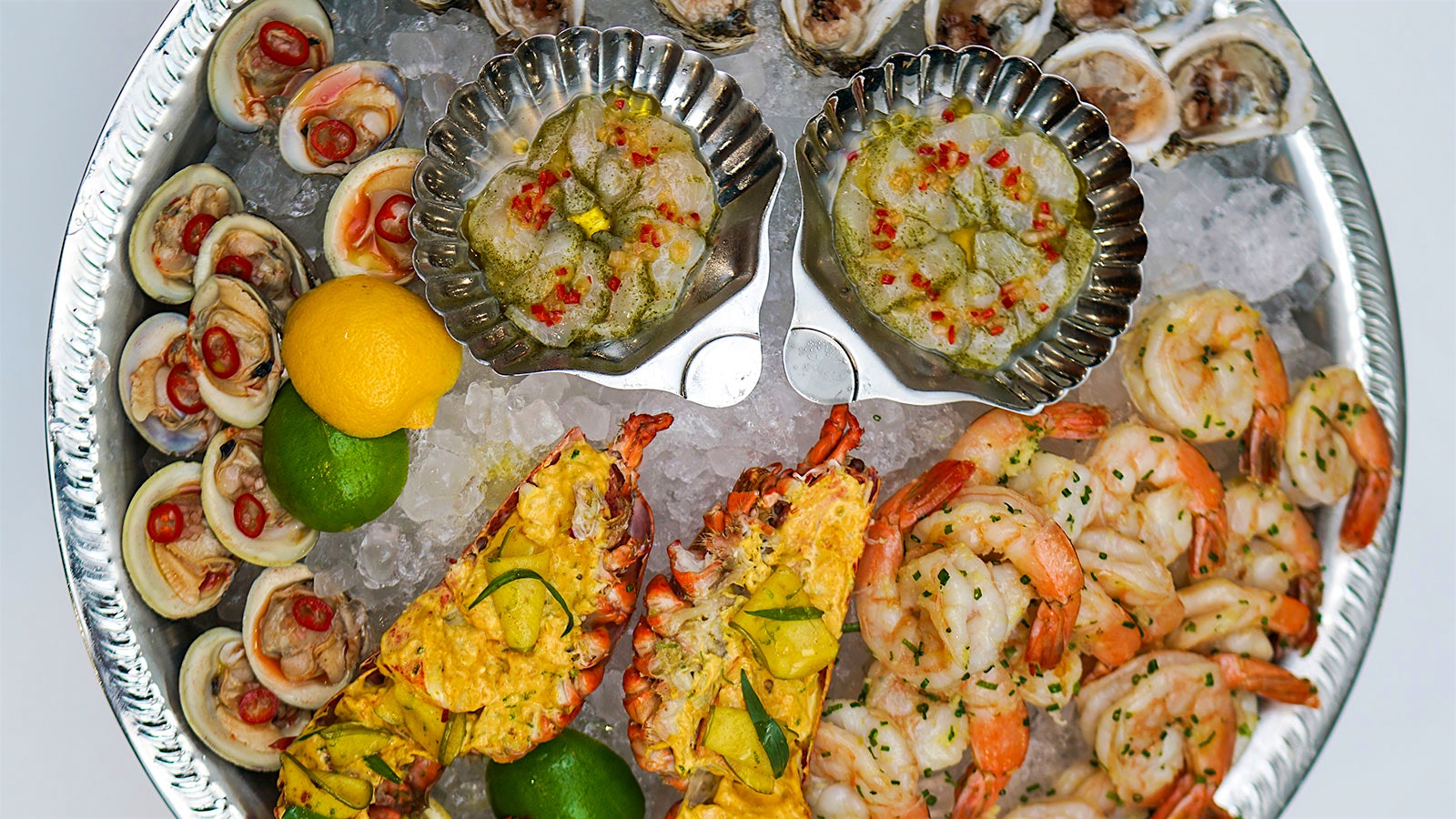 A platter of clams, oysters, shrimp and lobster at Dirty French Steakhouse
